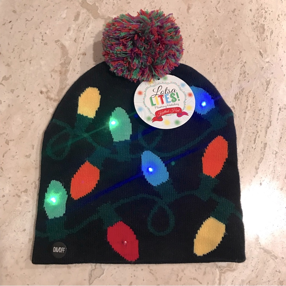 NWT Flashy Holiday Knitted Hat by Lotsa Lites. On/off switch controls lights.